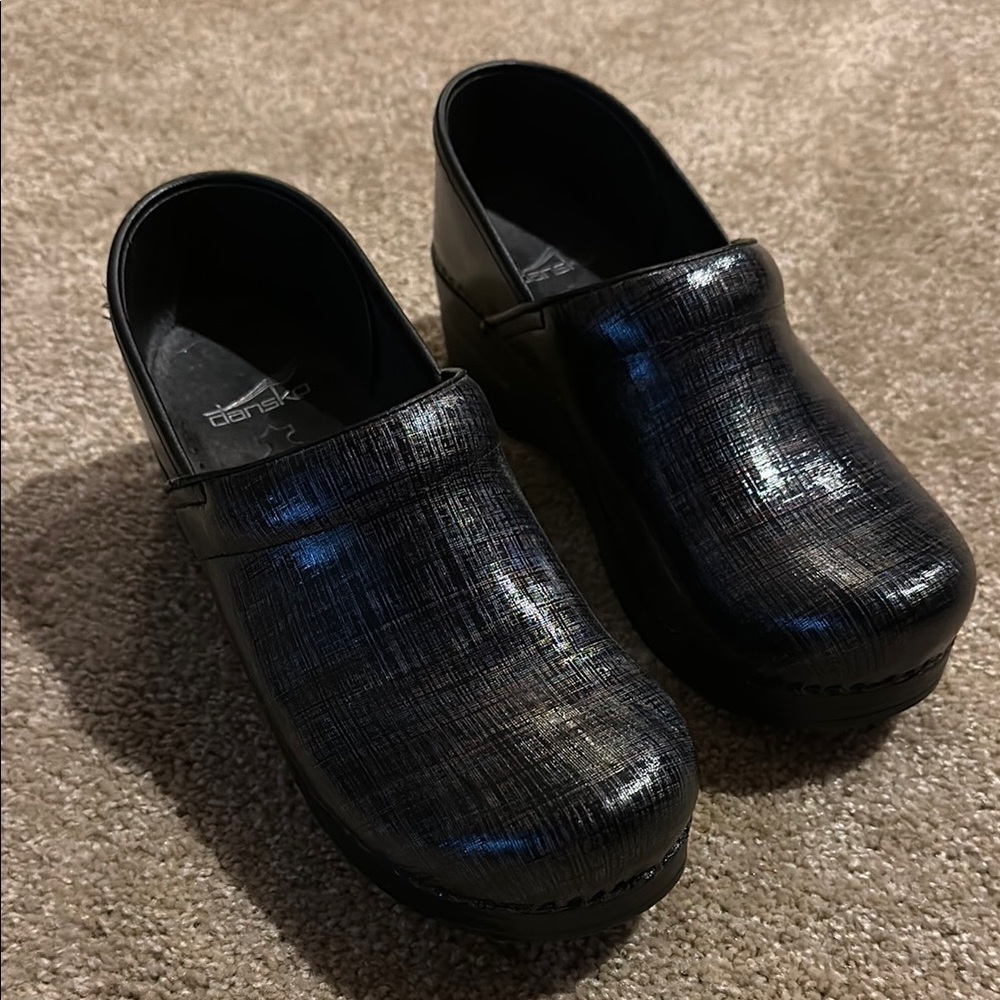Dansko professional metallic black clogs.  Size 38 EU.  Good condition.